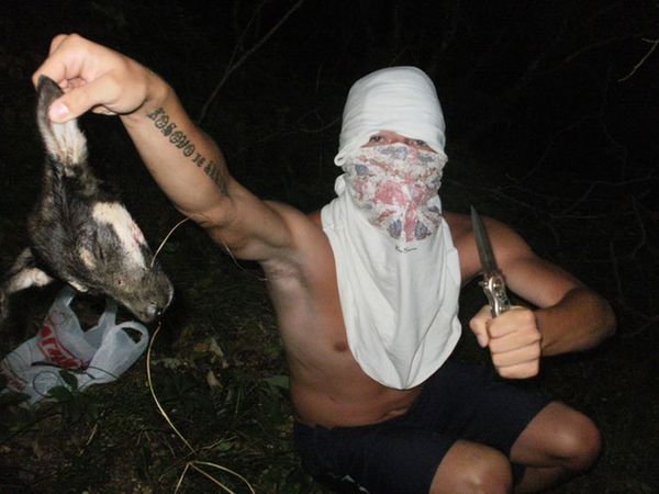 Russian neo-Nazi killing dog3