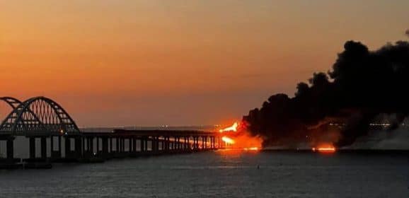 The bridge connecting occupied Crimea to Russia was blown up and on fire: video